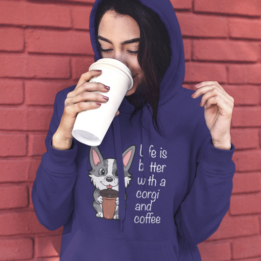 A model is drinking from a travel coffee cup and wearing wearing a hoodie with a cardigan corgi holding a cup of coffee. The text says "Life is better with a corgi and coffee". The sweatshirt is purple.