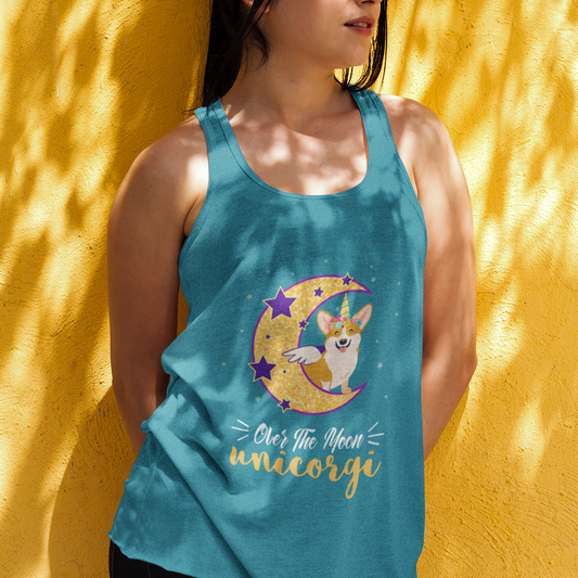 A model wearing a teal racerback tank top with a corgi that has wings and a unicorn horn. The corgi is sitting on a crescent moon with the text "Over the moon unicorgi". 