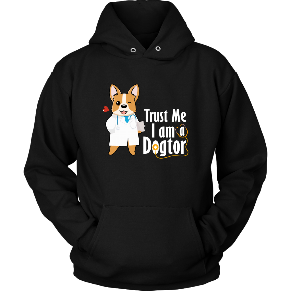 A hoodie with the text "Trust me I am a Dogtor" with a picture of a corgi dressed as a doctor. The hoodie is black. 