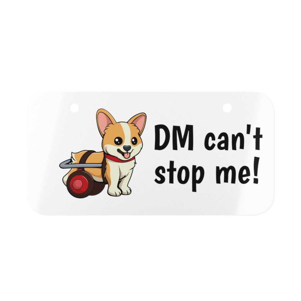 Our license plate with the text "DM can't stop me!" and a fawn corgi in a wheelchair. 