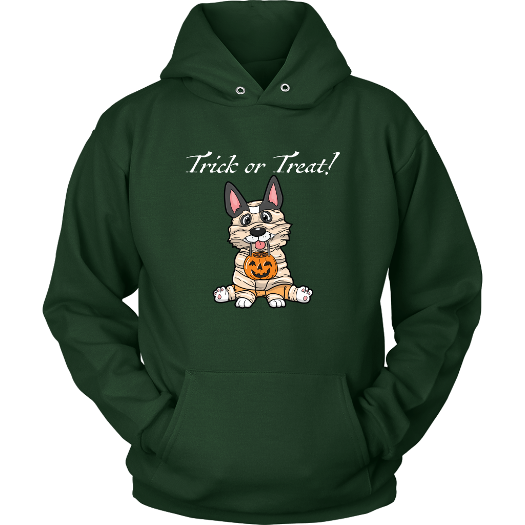 A hoodie with a tricolor corgi wearing a mummy costume. The text says "Trick or Treat" and the hoodie is green.