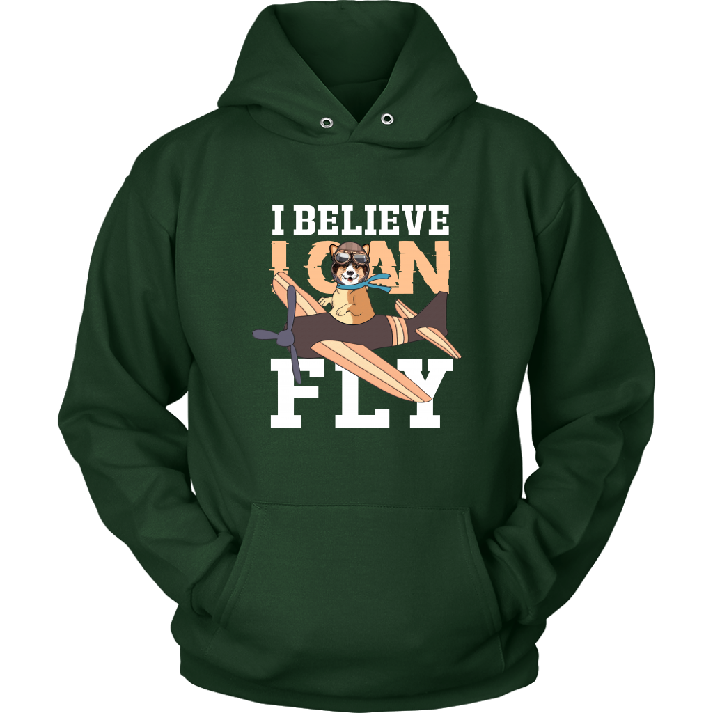 A flat lay of a dark green hoodie that has a corgi flying a play with the text "I believe I can fly".