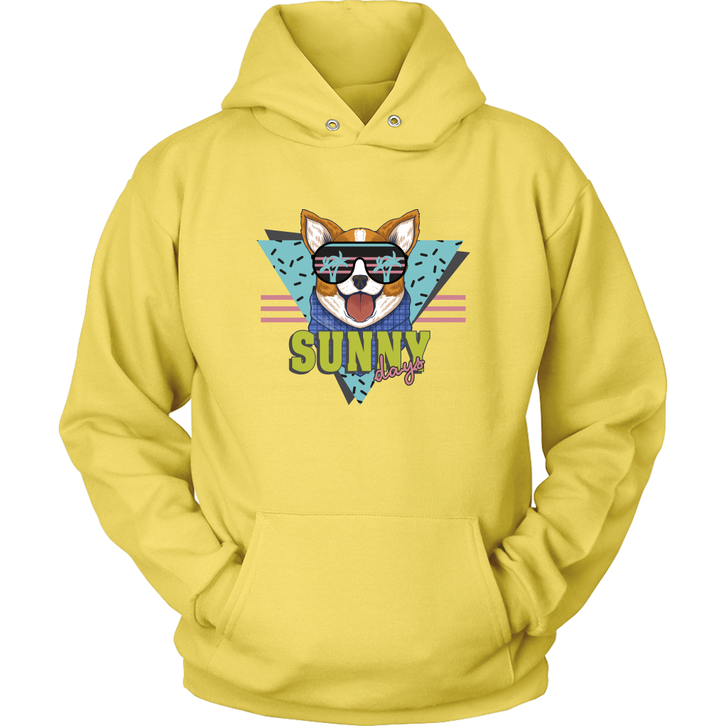 A flat lay of a hoodie with the text "Sunny Days" and a corgi in sunglasses. The hoodie is yellow colored.