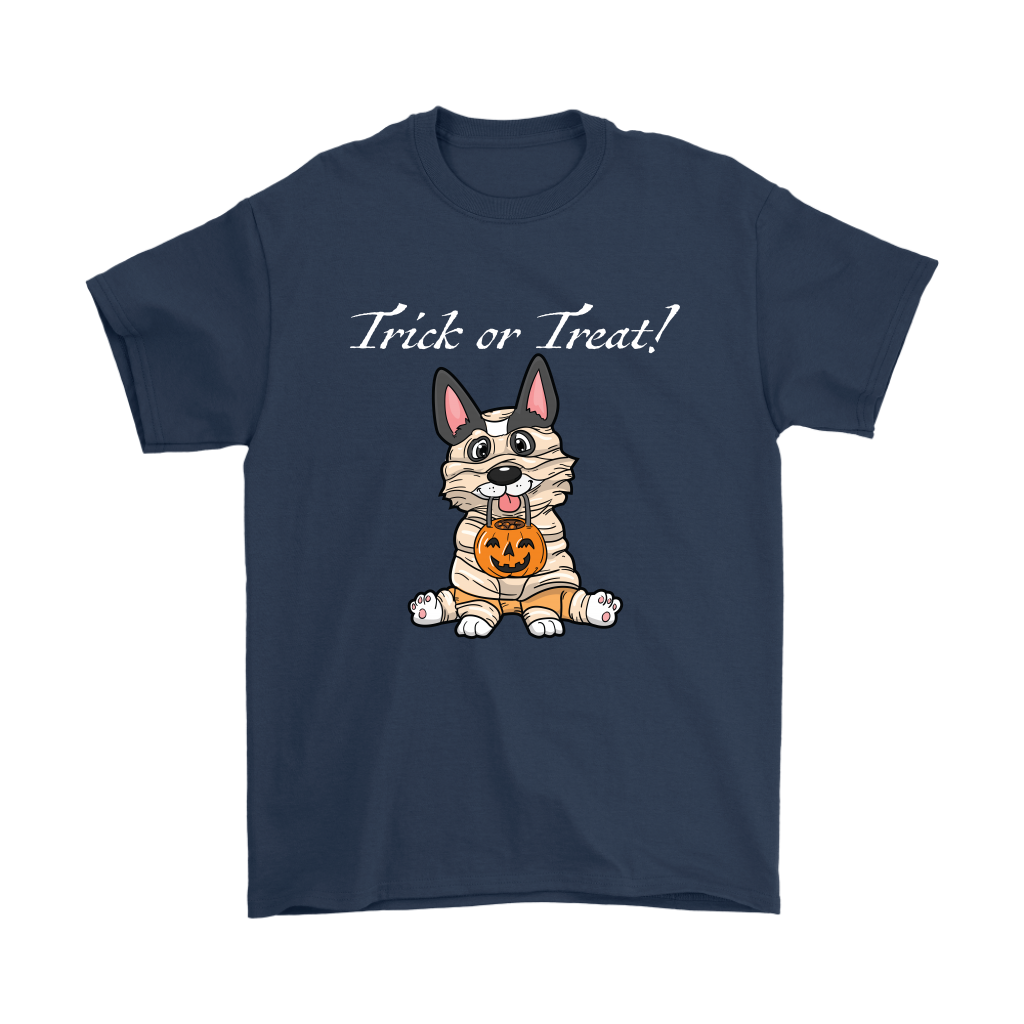 A t shirt with a tricolor corgi wearing a mummy costume. The text says "Trick or Treat" and the shirt is dark blue.