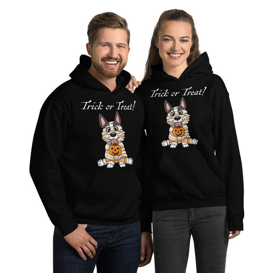 A couple modeling our hoodies with a tricolor corgi dressed as a mummy on the front.