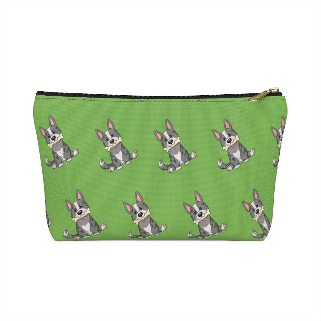 Green make up bag with a pattern of a cardigan corgi holding a bone in its mouth, black zipper