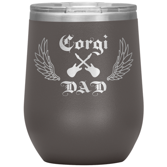 An insulated tumbler with the text "Corgi Dad" in a gothic style font with guitars and wings. The tumbler is pewter colored.