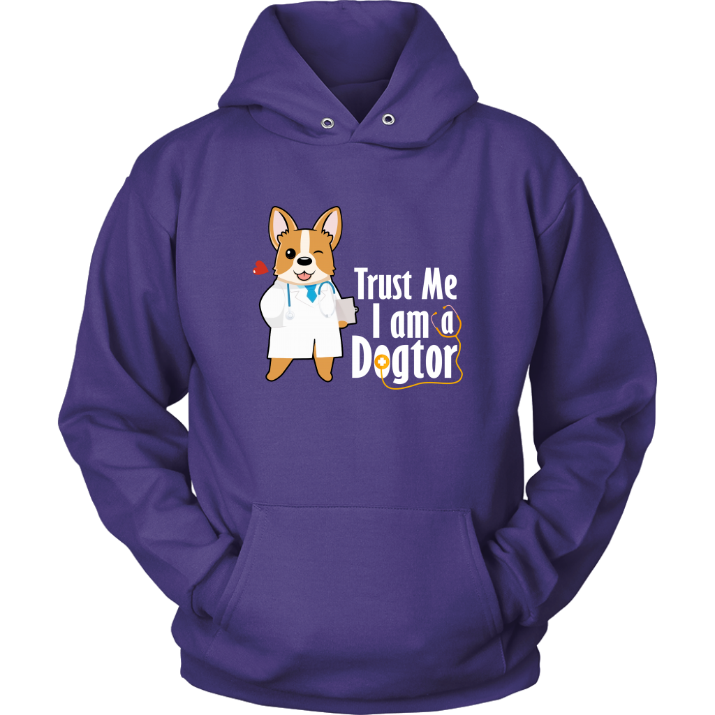 A hoodie with the text "Trust me I am a Dogtor" with a picture of a corgi dressed as a doctor. The hoodie is purple.