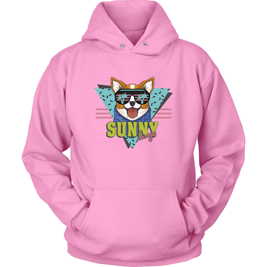 A flat lay of a hoodie with the text "Sunny Days" and a corgi in sunglasses. The hoodie is pink colored.