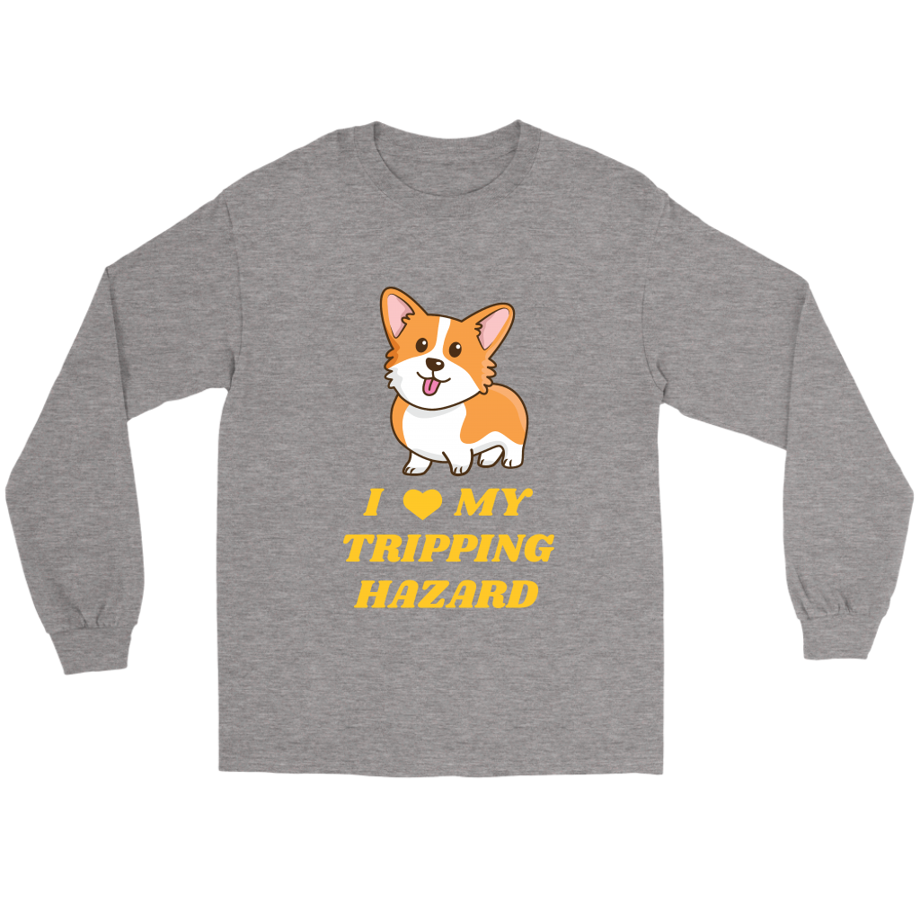 A flat lay of a long sleeved shirt that has a corgi with its tongue sticking out and yellow text that says "I love my tripping hazard". The shirt is heather grey. 